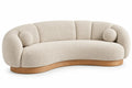 Sofá curvo tapizado de contorno redondeado, beige y marrón